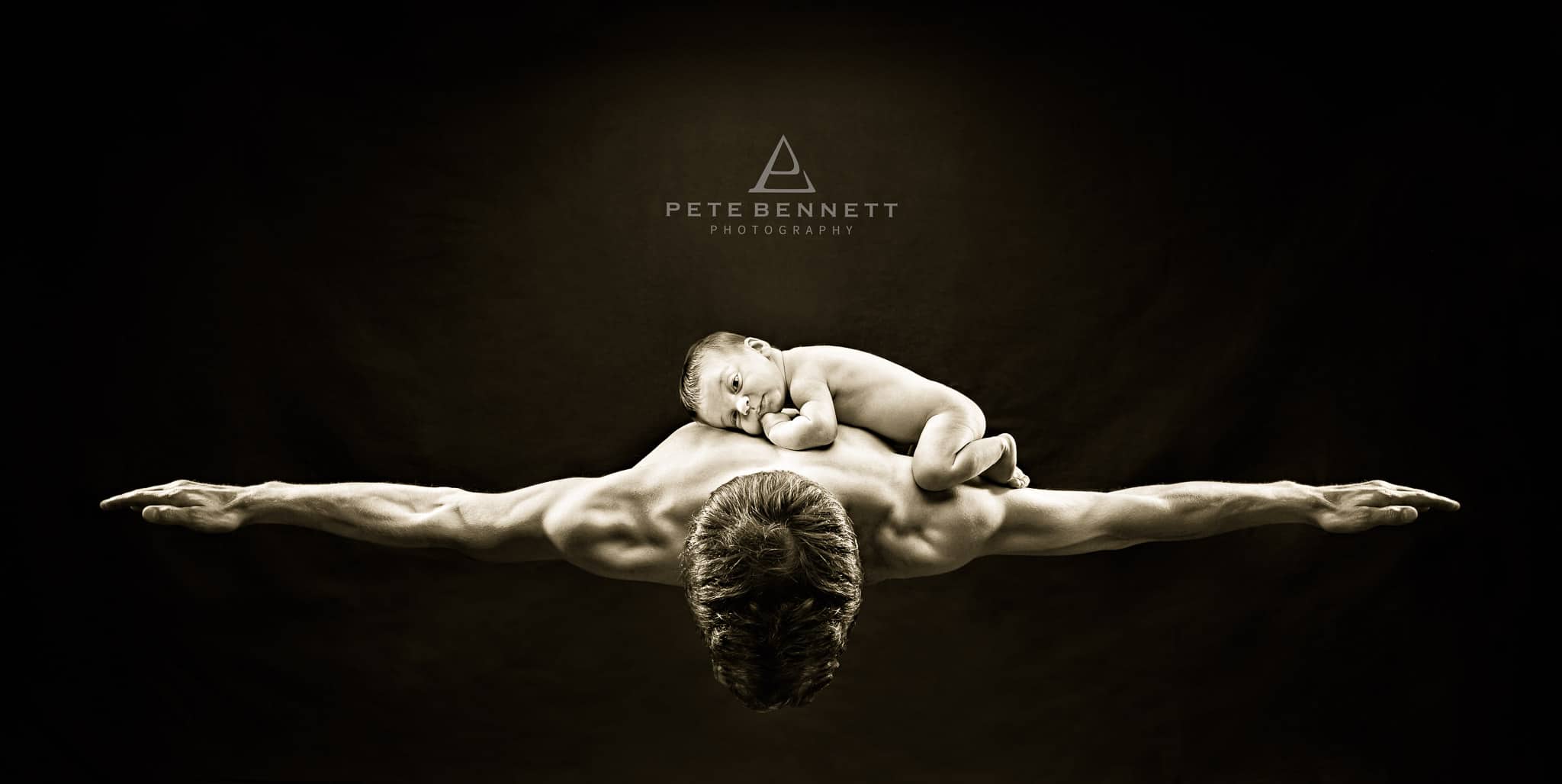 Baby on dads back baby photography newborn photography Pete Bennett Photography Fitness