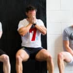 Healthy lifestyle Fitness men struggling to squat