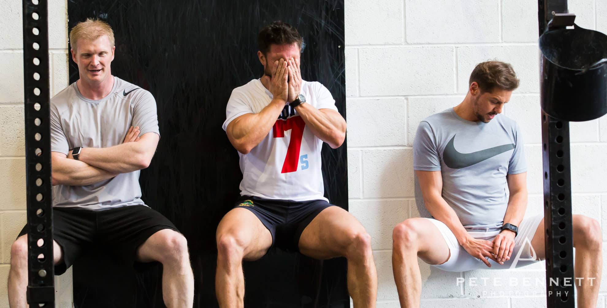 Healthy lifestyle Fitness men struggling to squat